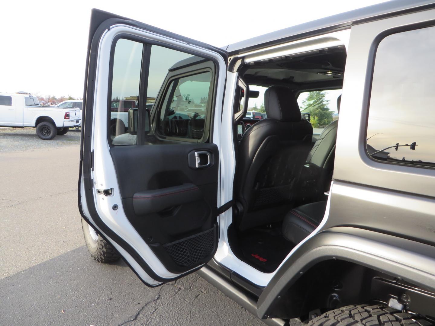 2020 BLACK /BLACK Jeep Wrangler Unlimited Rubicon (1C4HJXFGXLW) with an 3.6L V6 DOHC 24V FFV engine, 6A transmission, located at 2630 Grass Valley Highway, Auburn, CA, 95603, (530) 508-5100, 38.937893, -121.095482 - STANDARD CONTENT AEV RX Front Bumper AEV Front Skid Plate AEV Non-Winch Cover Plate AEV 7000 Series Lights AEV Light Cover Kit AEV 2.5" DualSport RT Suspension System AEV Front Geometry Correction Brackets AEV Steering Stabilizer AEV Rear Bumper AEV Swing-Out Tire Carrier AEV CHMSL Mount - Photo#39